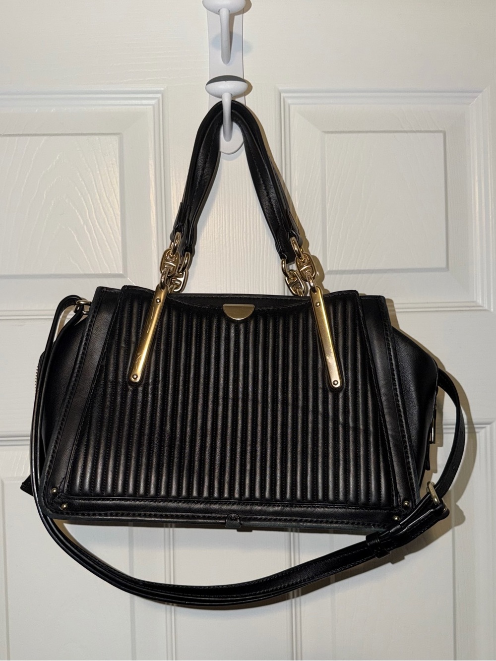 Black Quilted Coach Leather Shoulder Bag with Gold rivets and hardware